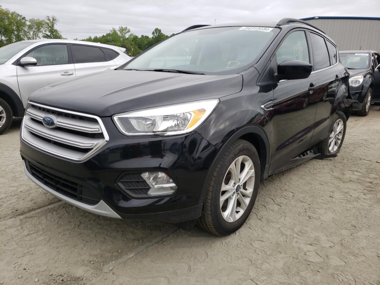 Photo 2 from auction – 2018 FORD ESCAPE SE with VIN 1FMCU0GDXJUA52106
