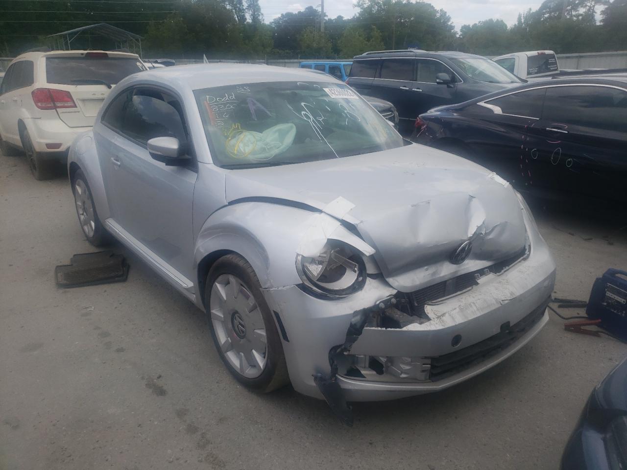 VOLKSWAGEN BEETLE 2012 with VIN 3VWJP7AT3CM624858 - Photo from auction