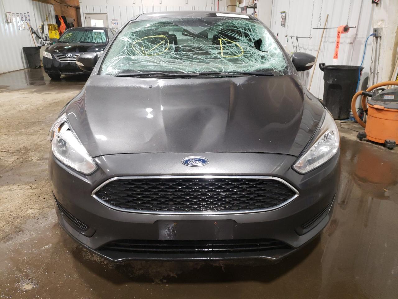 Photo 9 from auction – 2015 FORD FOCUS SE with VIN 1FADP3F21FL307472