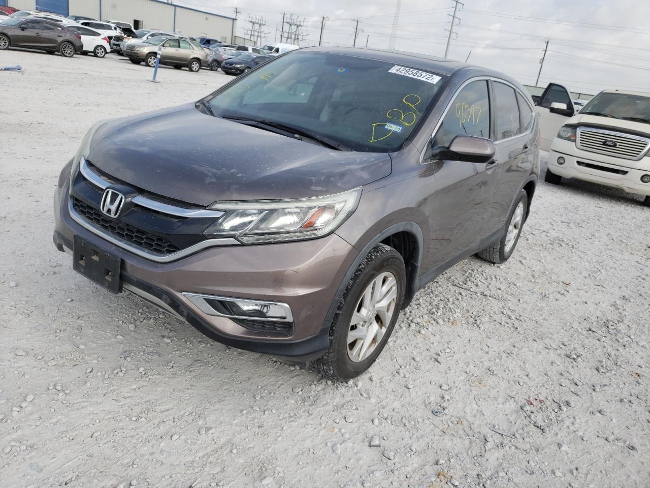 Photo 2 from auction – 2015 HONDA CR-V with VIN 3CZRM3H56FG700214