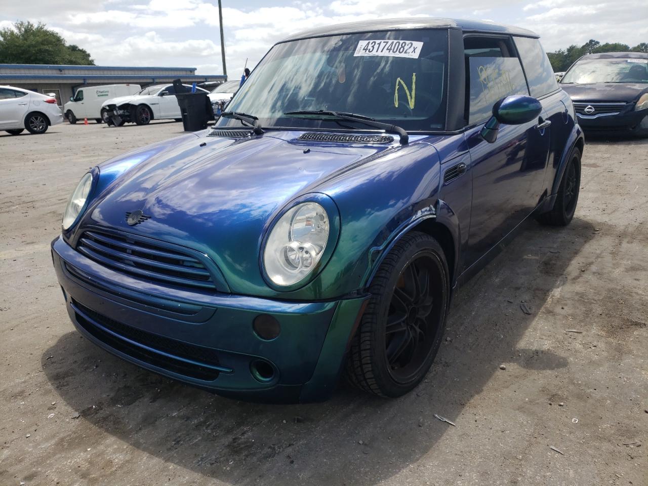 Photo 2 from auction – 2006 MINI COOPER with VIN WMWRC33526TK73291