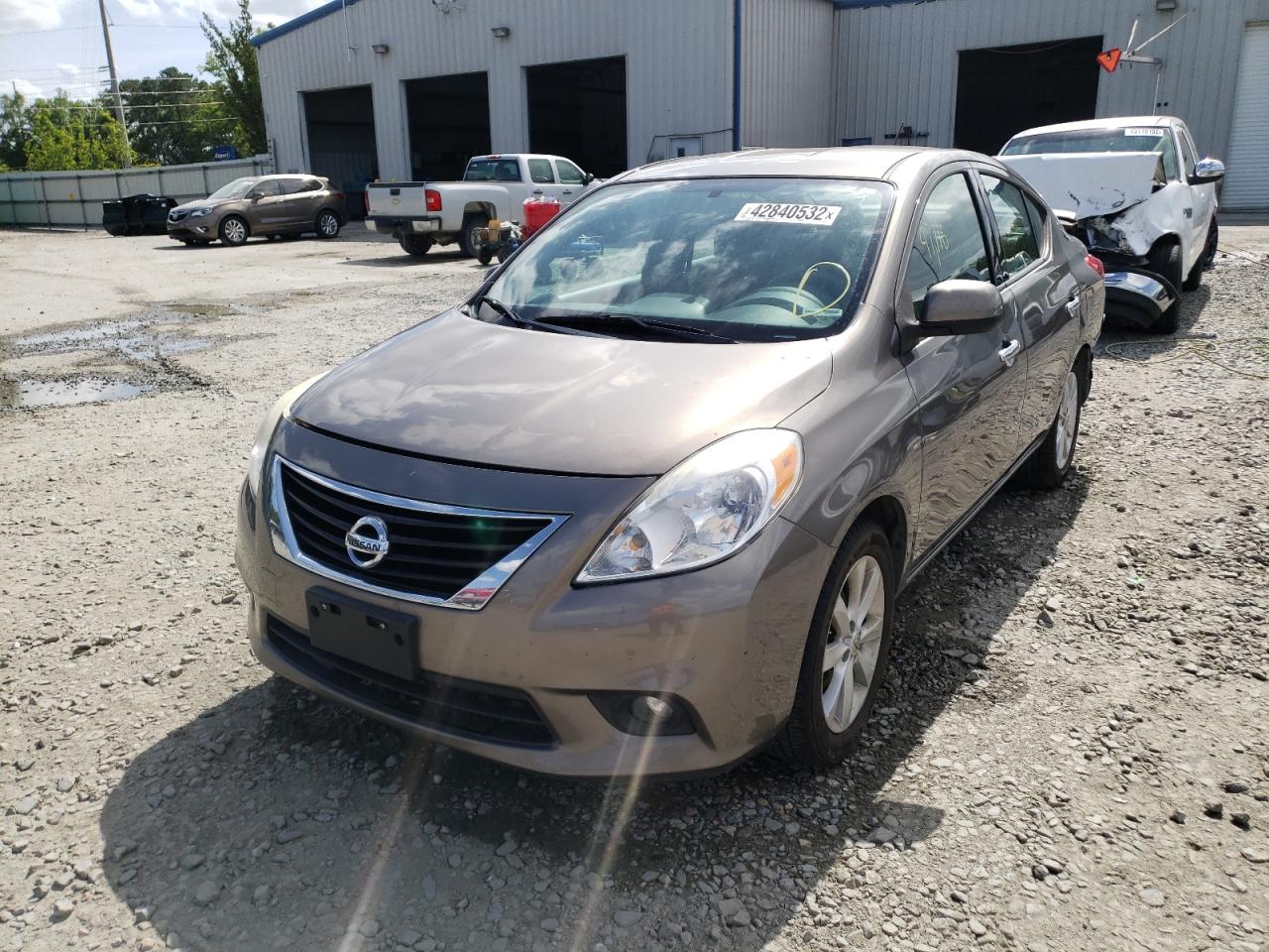 Photo 2 from auction – 2014 NISSAN VERSA S with VIN 3N1CN7AP9EL843033