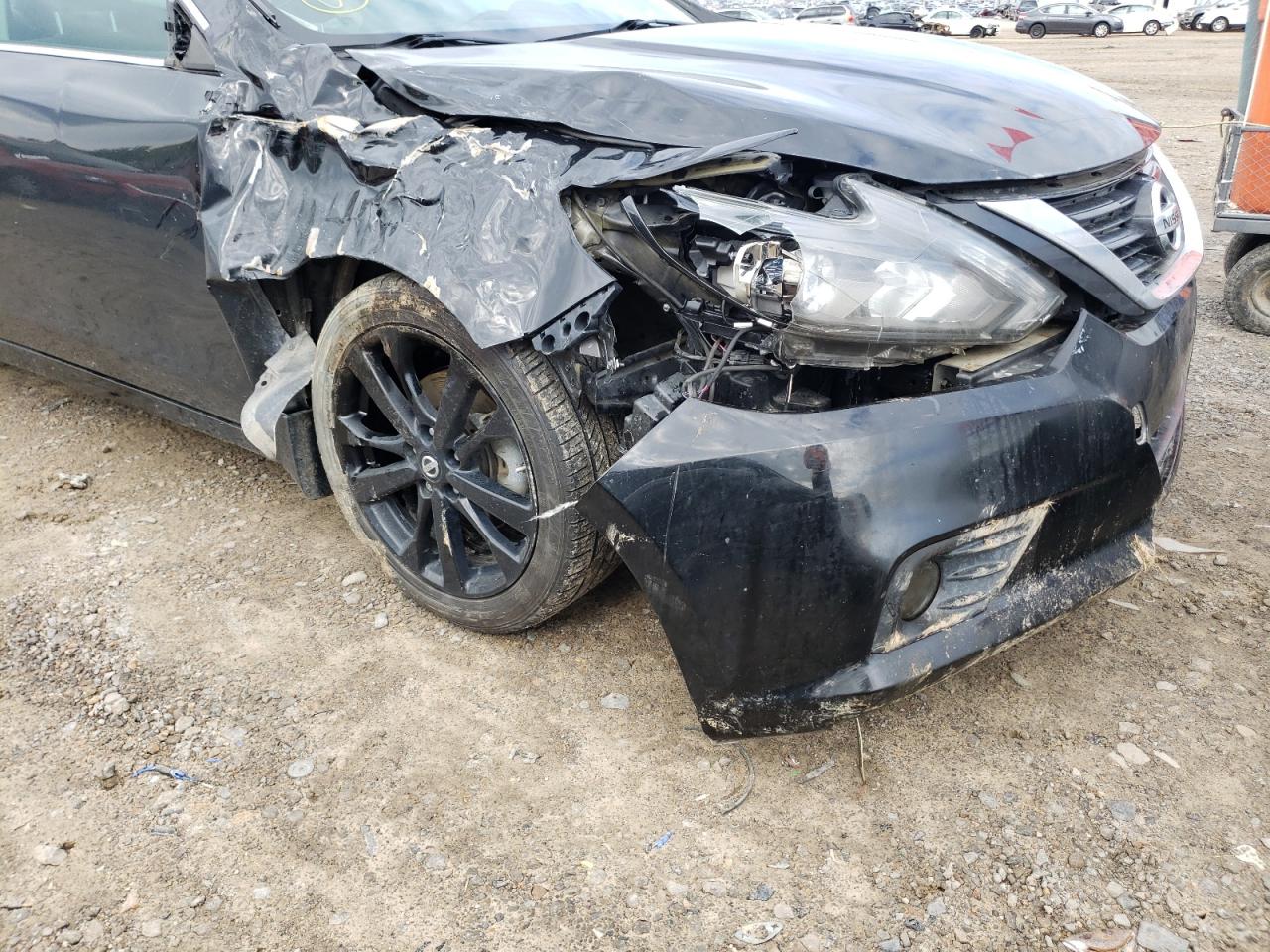 Photo 9 from auction – 2017 NISSAN ALTIMA 2.5 with VIN 1N4AL3AP8HC298404