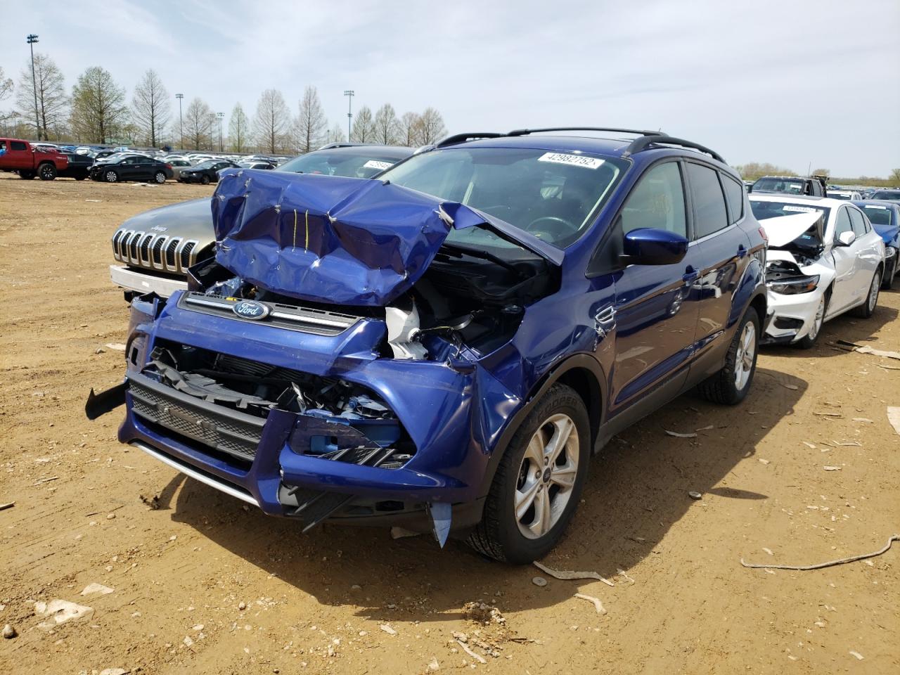 Photo 2 from auction – 2016 FORD ESCAPE SE with VIN 1FMCU9G96GUA39992