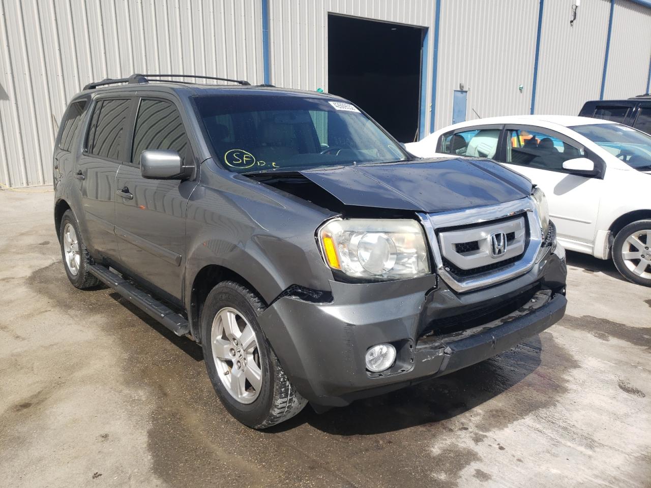 HONDA PILOT EXL 2009 with VIN 5FNYF48519B004002 - Photo from auction