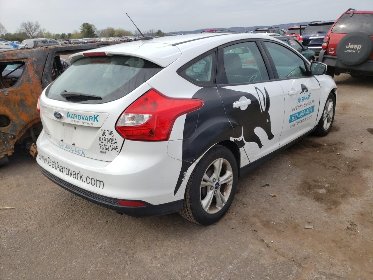 Photo 4 from auction – 2014 FORD FOCUS SE with VIN 1FADP3K25EL402394