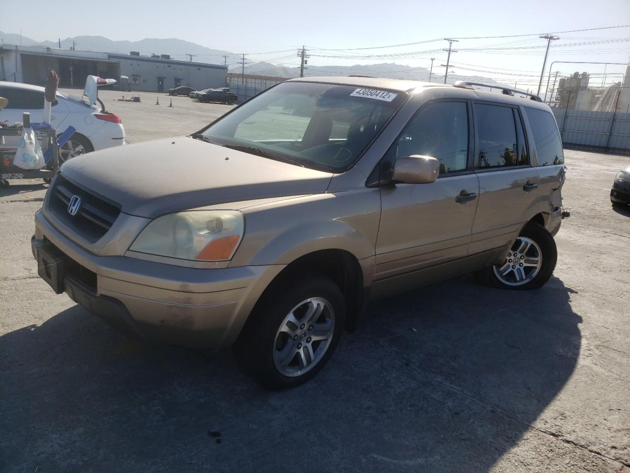 Photo 2 from auction – 2003 HONDA PILOT EX with VIN 2HKYF18433H519288