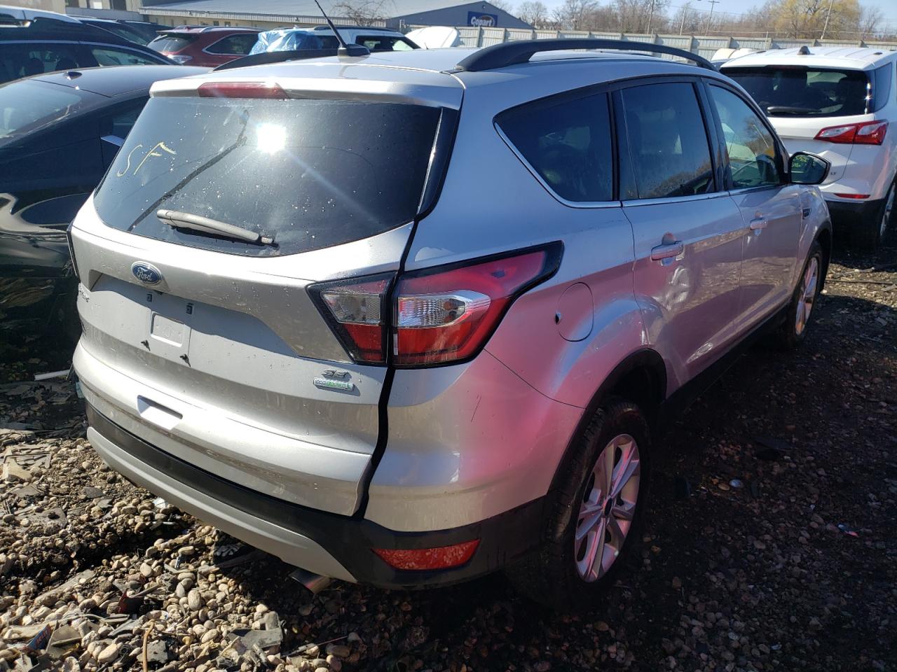 Photo 4 from auction – 2018 FORD ESCAPE SE with VIN 1FMCU0GD0JUA85616