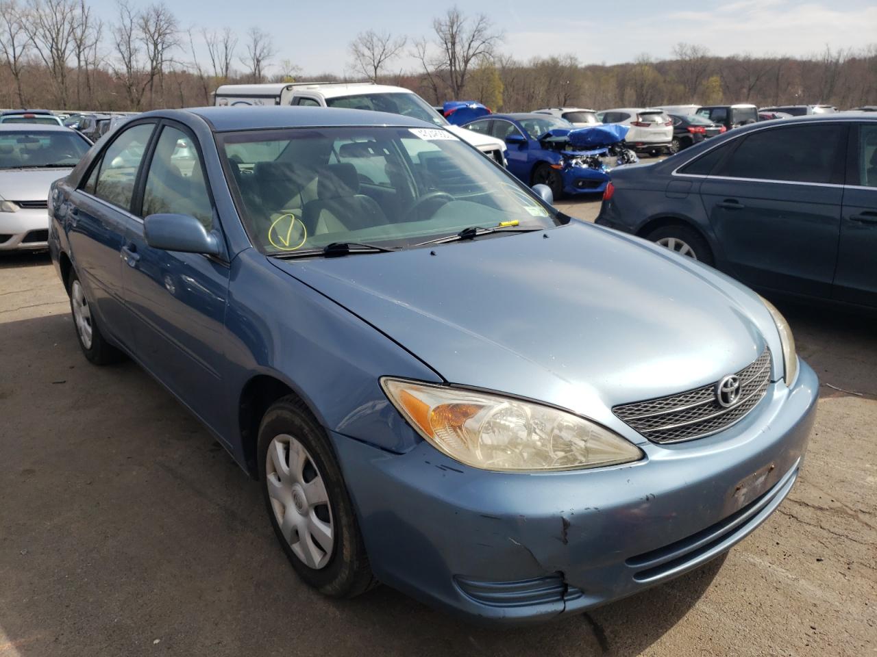 TOYOTA CAMRY LE 2003 with VIN 4T1BE32K03U720126 - Photo from auction