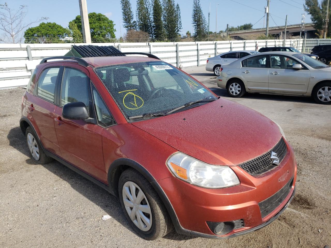 SUZUKI SX4 2011 with VIN JS2YB5A32B6304326 - Photo from auction