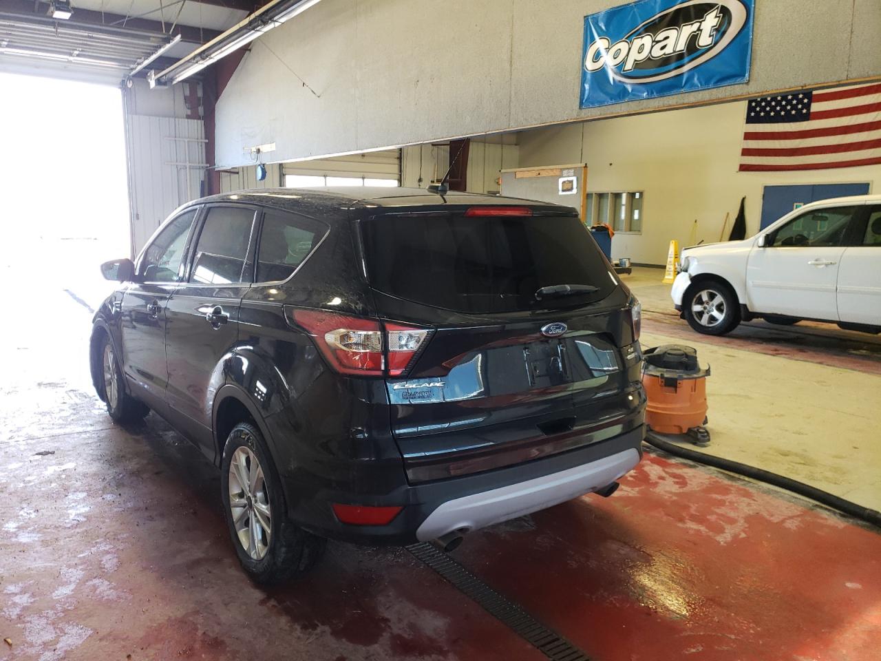 Photo 3 from auction – 2017 FORD ESCAPE SE with VIN 1FMCU9GDXHUD64649