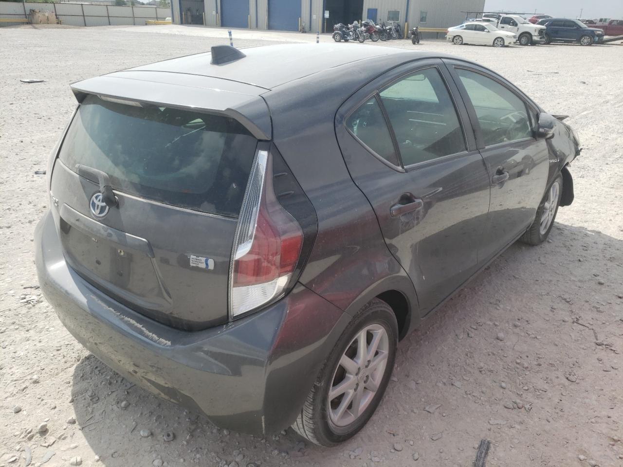 Photo 4 from auction – 2015 TOYOTA PRIUS C with VIN JTDKDTB39F1094064