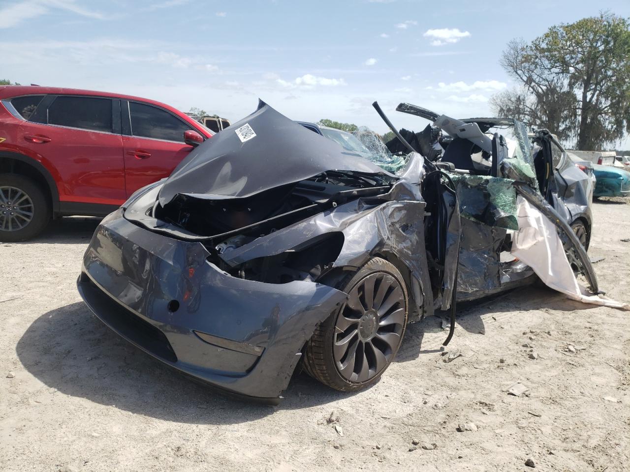 Photo 2 from auction – 2021 TESLA MODEL Y with VIN 5YJYGDEF9MF261038