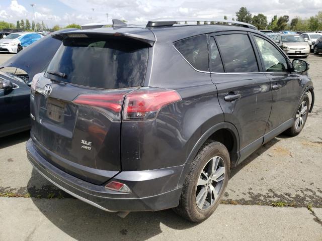 Photo 4 from auction – 2017 TOYOTA RAV4 XLE with VIN JTMRFREV1HJ105098