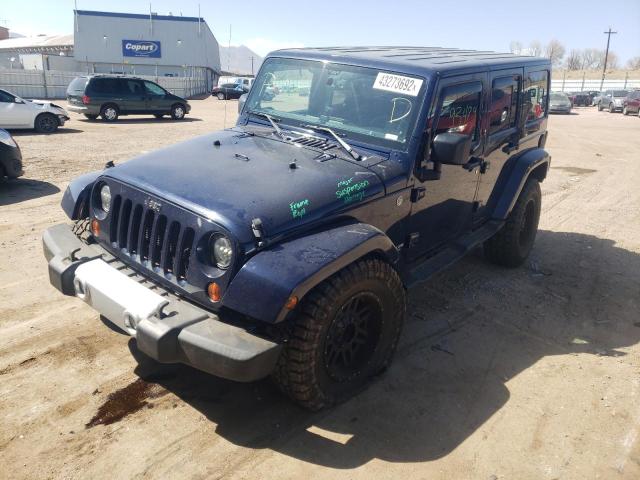 Photo 2 from auction – 2013 JEEP WRANGLER U with VIN 1C4BJWEG1DL618401