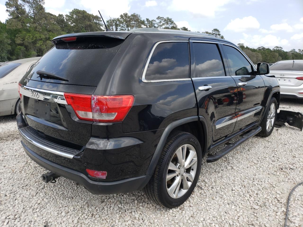 Photo 4 from auction – 2012 JEEP GRAND CHER with VIN 1C4RJECT4CC151398