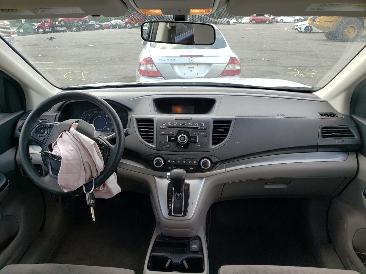 Photo 9 from auction – 2014 HONDA CR-V LX with VIN 5J6RM3H31EL034704