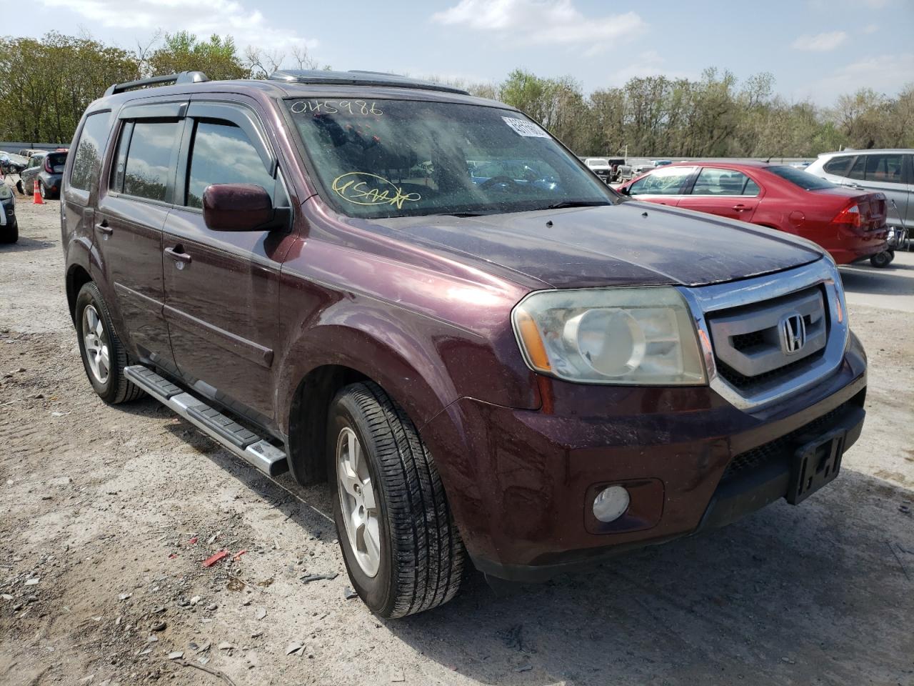 HONDA PILOT EXL 2011 with VIN 5FNYF3H69BB045986 - Photo from auction
