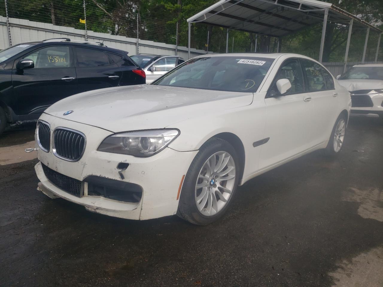 Photo 2 from auction – 2013 BMW 740 I with VIN WBAYA6C56DD143945