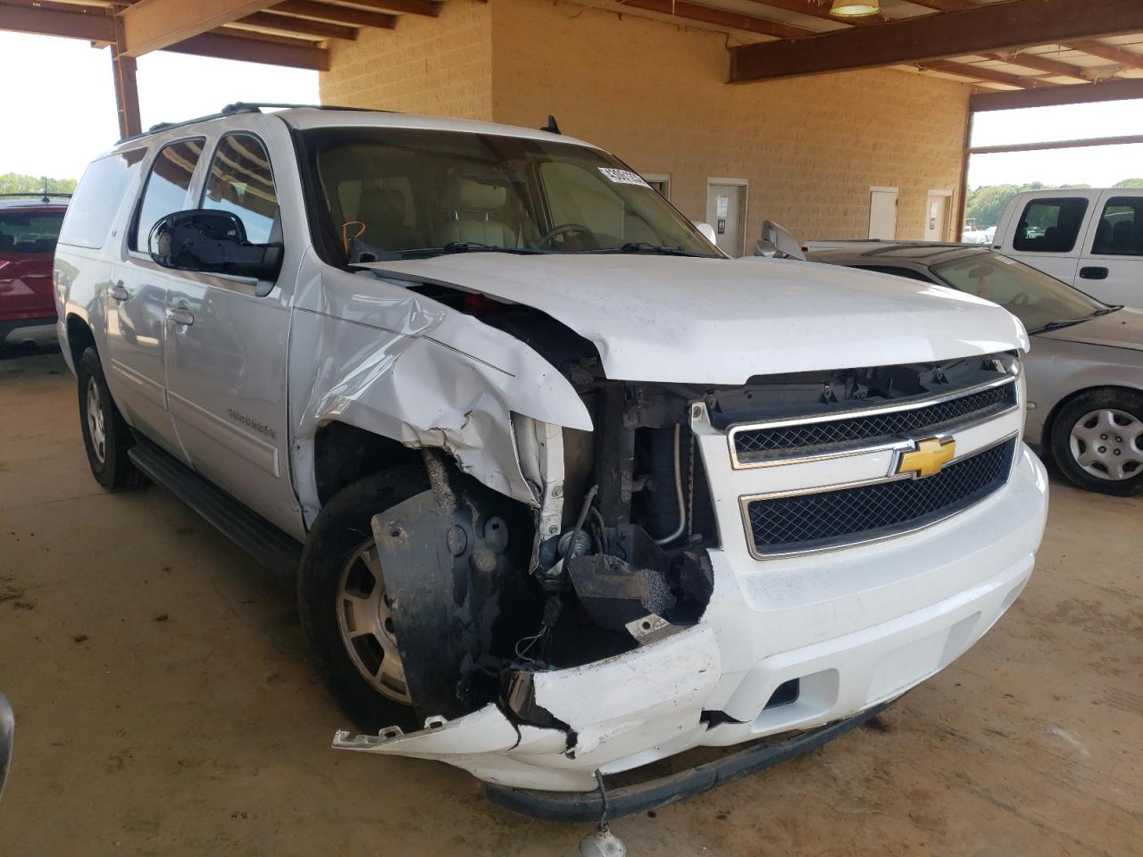 CHEVROLET SUBURBAN C 2011 with VIN 1GNSCJE01BR153992 - Photo from auction
