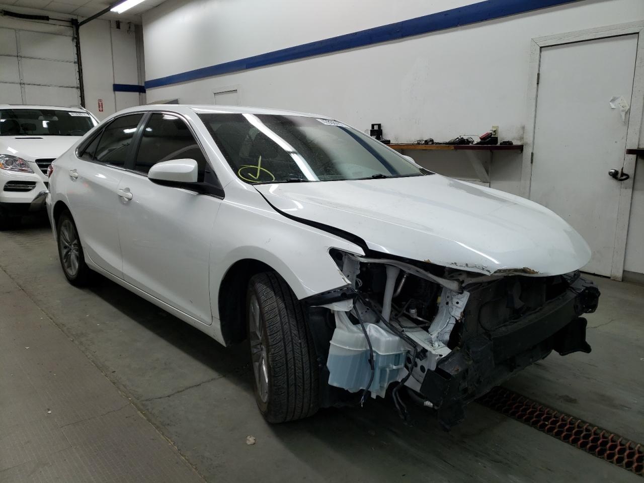 TOYOTA CAMRY LE 2016 with VIN 4T1BF1FK7GU171087 - Photo from auction