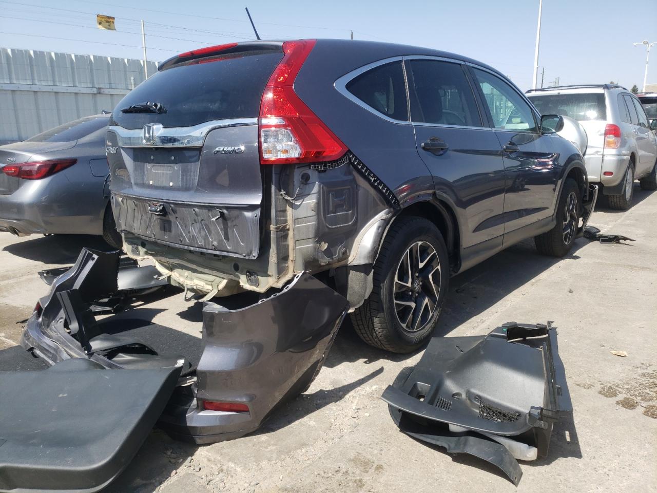Photo 4 from auction – 2016 HONDA CR-V SE with VIN 5J6RM4H48GL060055