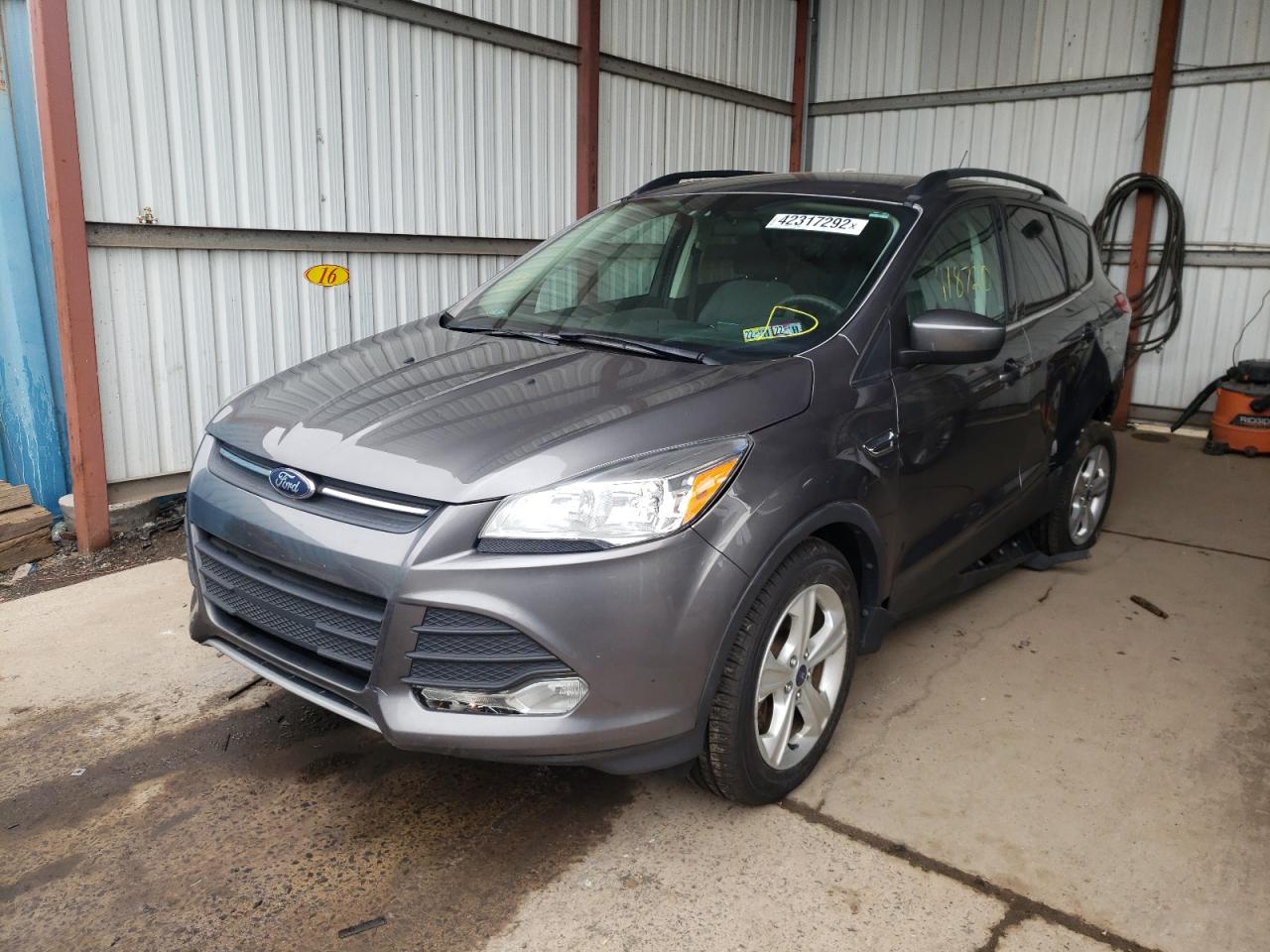 Photo 2 from auction – 2014 FORD ESCAPE SE with VIN 1FMCU9G90EUA57434