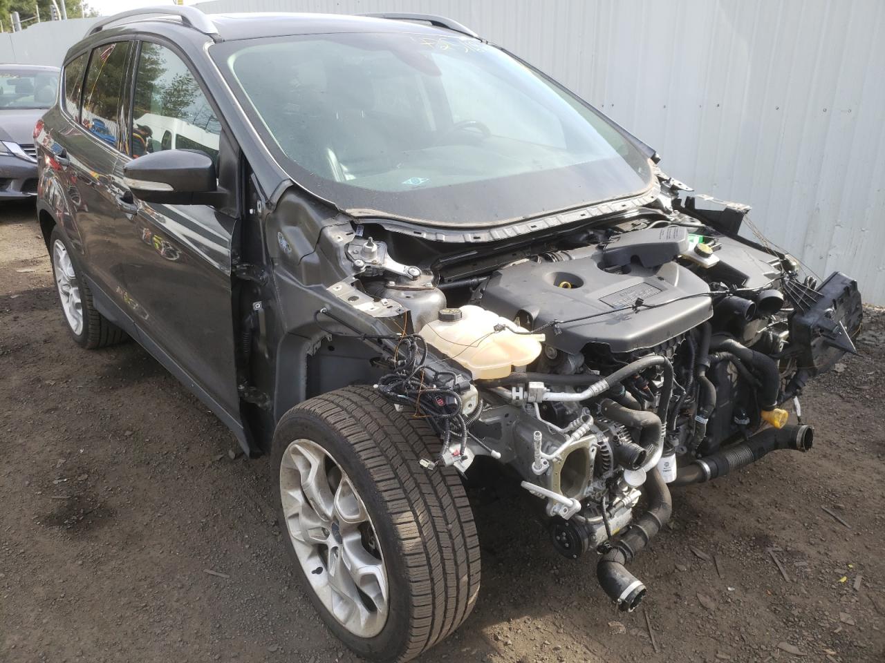 FORD ESCAPE TIT 2015 with VIN 1FMCU9J95FUB15418 - Photo from auction