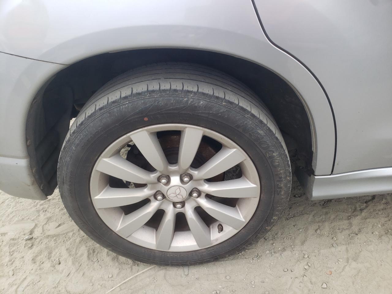 Foto 9 de la subasta – 2011 MITSUBISHI OUTLANDER con VIN JA4AP4AU8BZ010213