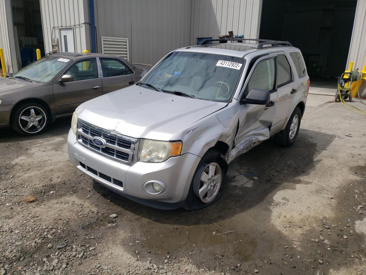 Photo 2 from auction – 2010 FORD ESCAPE XLT with VIN 1FMCU0D70AKD37052