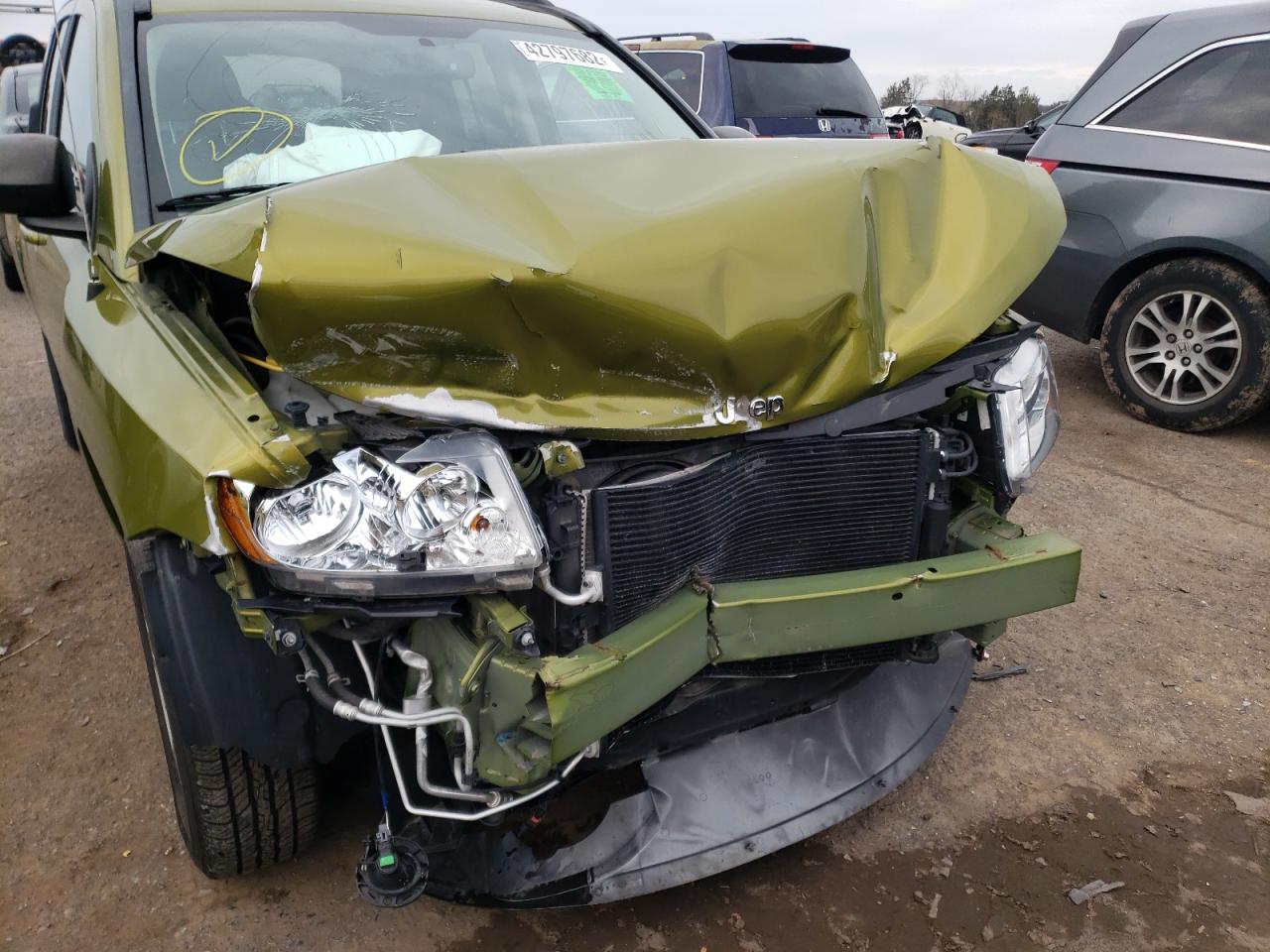 Photo 9 from auction – 2012 JEEP COMPASS SP with VIN 1C4NJDBB0CD625438