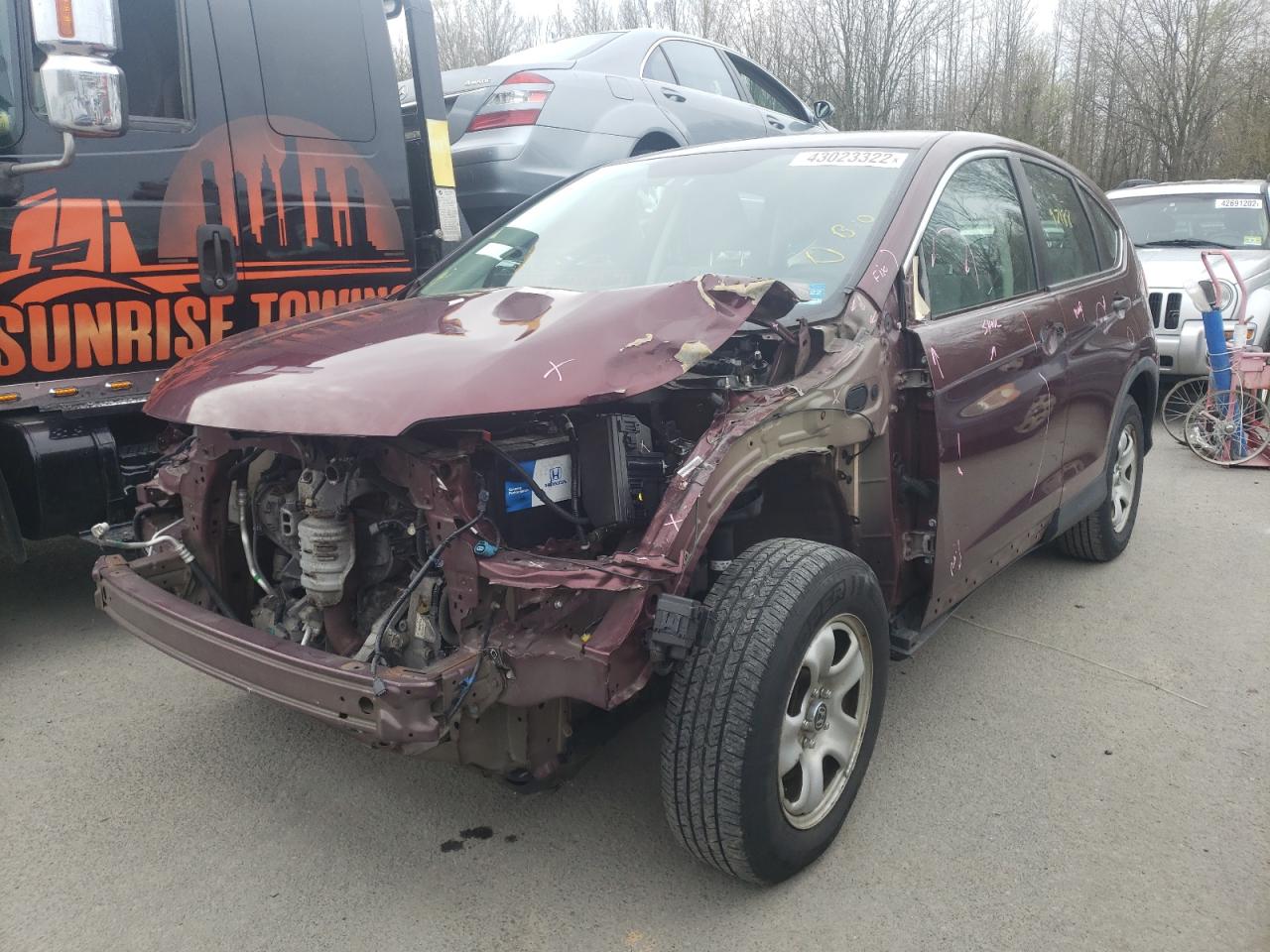 Photo 2 from auction – 2015 HONDA CR-V LX with VIN 5J6RM4H38FL076049