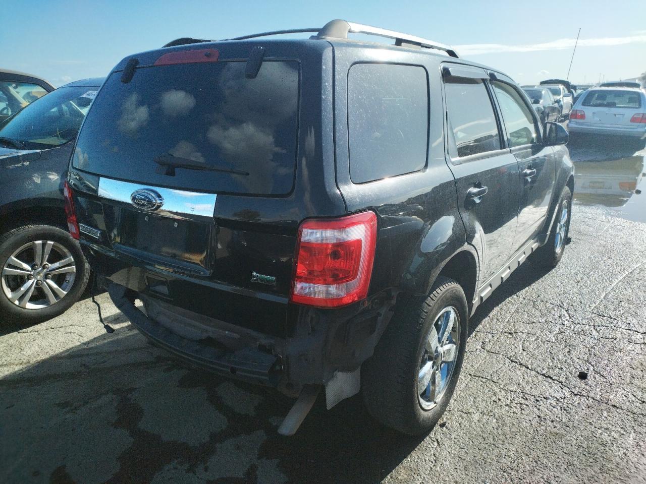 Photo 4 from auction – 2010 FORD ESCAPE LIM with VIN 1FMCU0EGXAKB90804