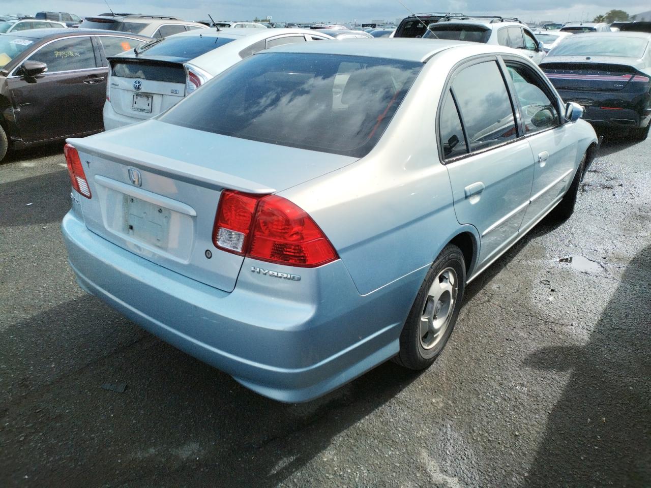 Photo 4 from auction – 2005 HONDA CIVIC HYBR with VIN JHMES95615S009480
