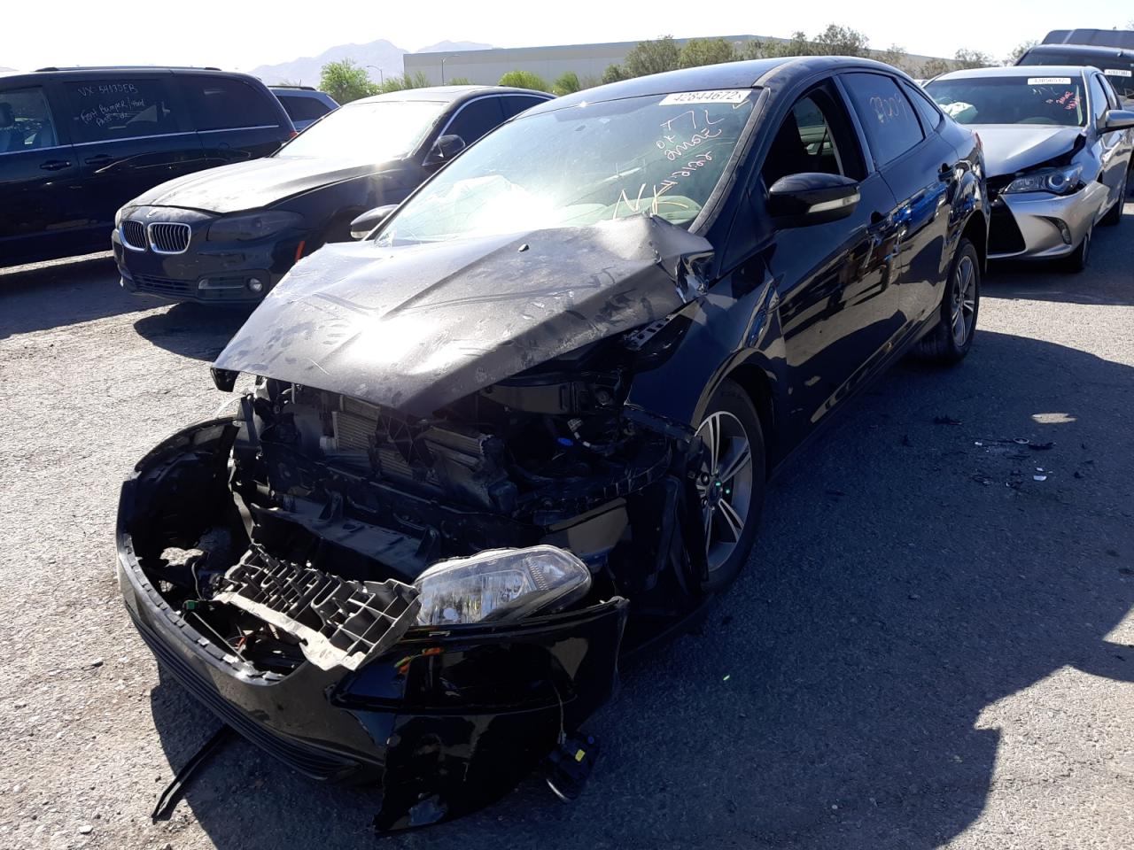 Photo 2 from auction – 2018 FORD FOCUS SE with VIN 1FADP3FE7JL203670