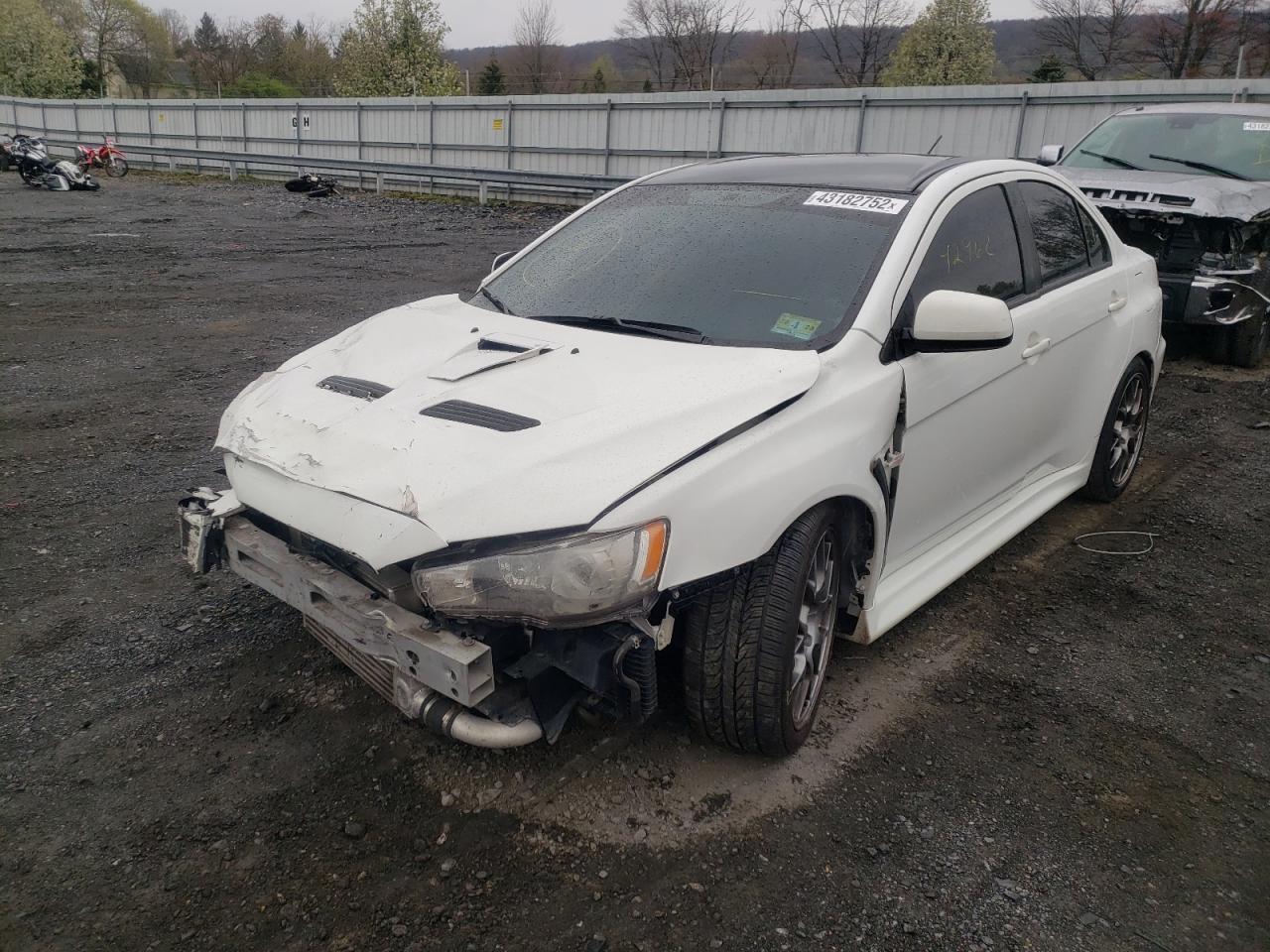 Photo 2 from auction – 2013 MITSUBISHI LANCER EVO with VIN JA32W5FV1DU009620