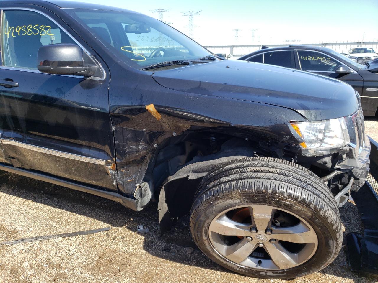 Photo 9 from auction – 2012 JEEP GRAND CHER with VIN 1C4RJFAG1CC350078