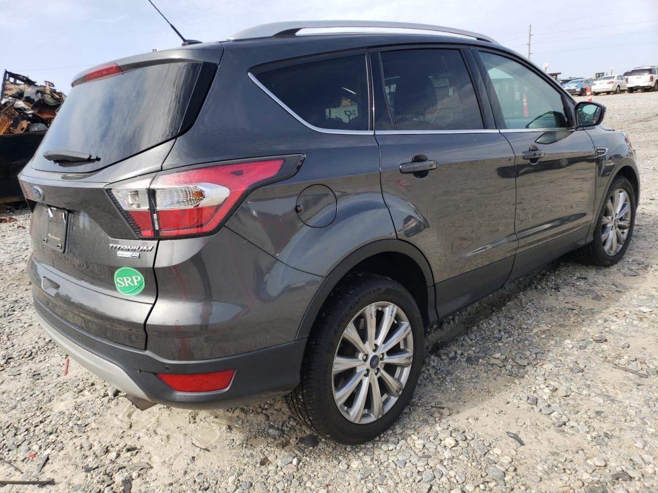 Photo 14 from auction – 2017 FORD ESCAPE TIT with VIN 1FMCU9J91HUB48399