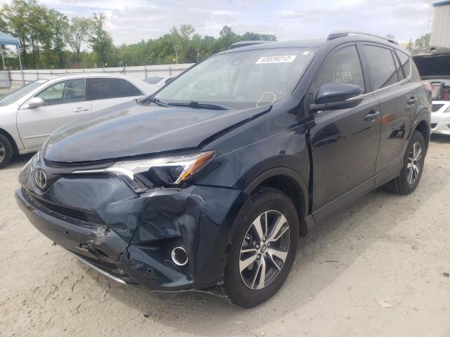 Photo 2 from auction – 2017 TOYOTA RAV4 XLE with VIN JTMWFREV1HD106074