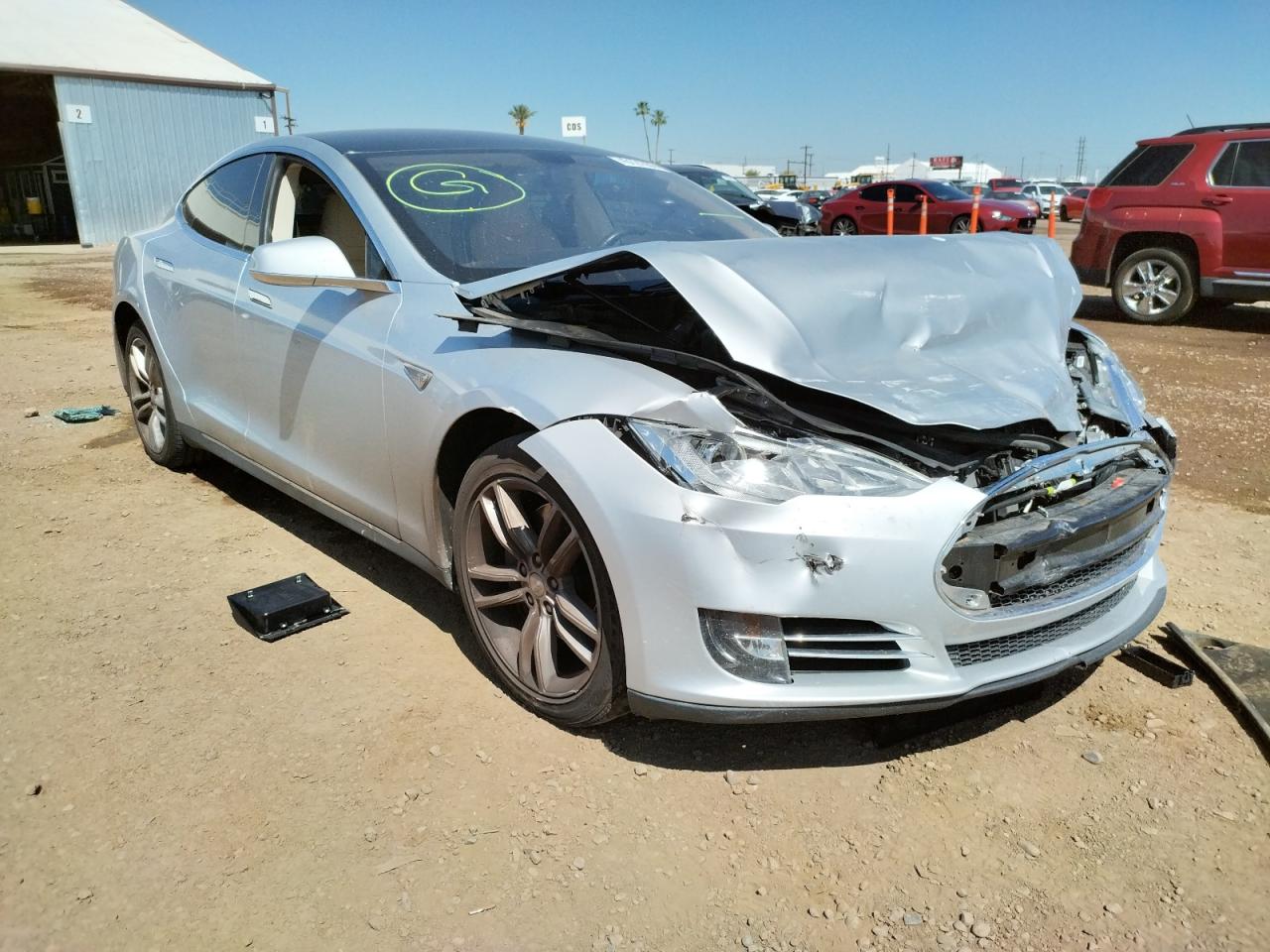 TESLA MODEL S 2013 with VIN 5YJSA1AG3DFP12940 - Photo from auction