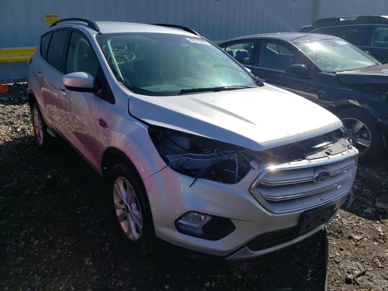FORD ESCAPE SE 2018 with VIN 1FMCU0GD0JUA85616 - Photo from auction