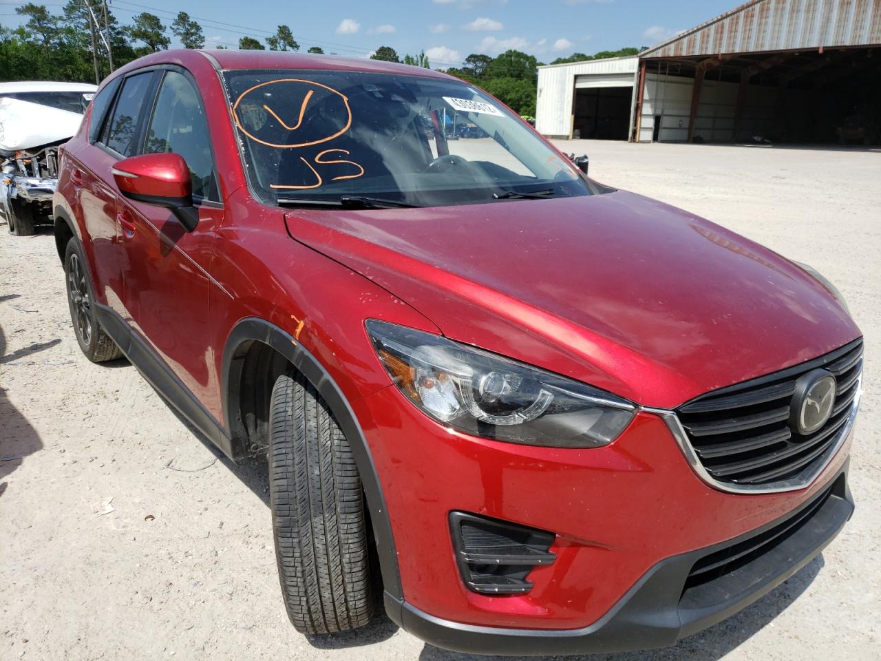 MAZDA CX-5 GT 2016 with VIN JM3KE2DY5G0724239 - Photo from auction
