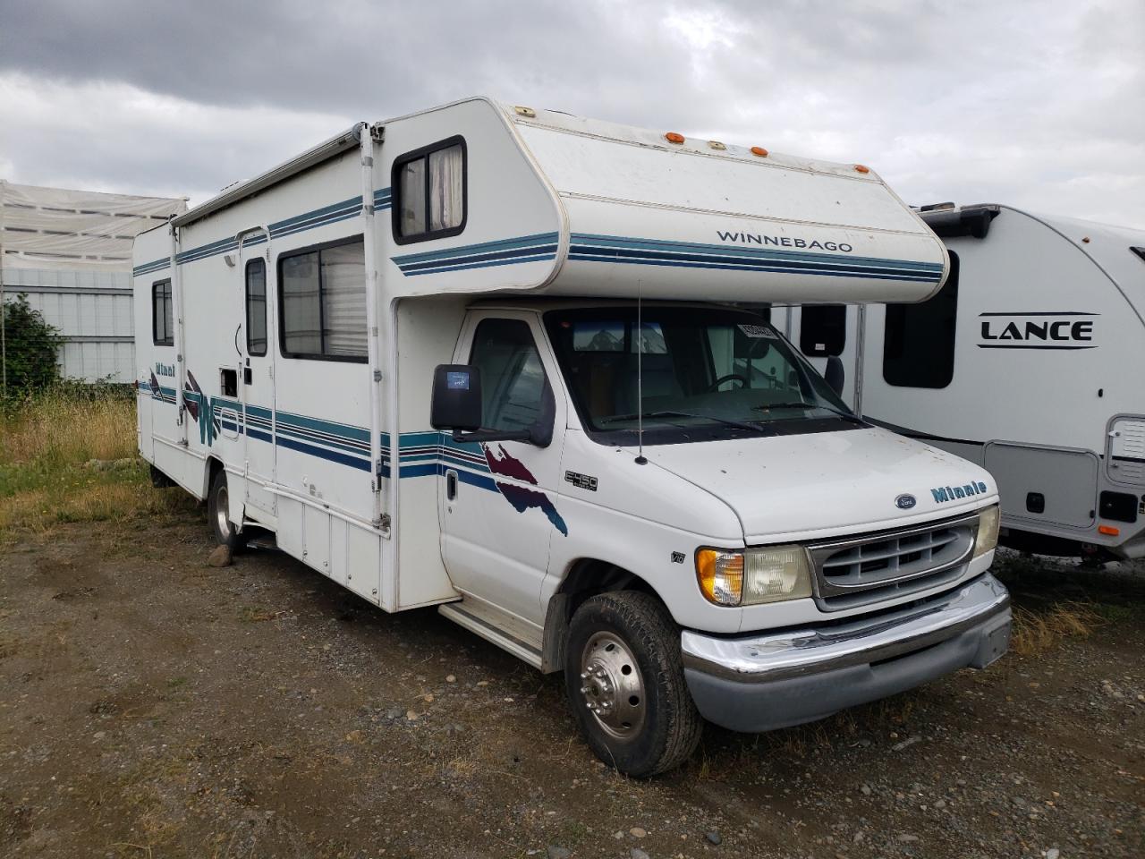 FORD ECONOLINE 1999 with VIN 1FDXE40S4XHA91693 - Photo from auction