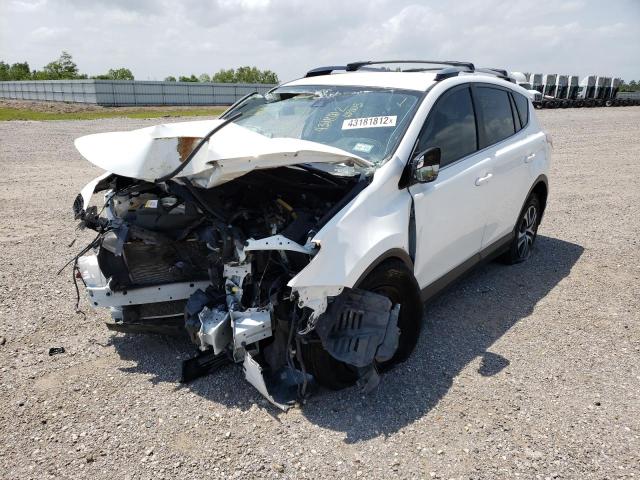 Photo 2 from auction – 2017 TOYOTA RAV4 LE with VIN JTMZFREV6HJ139103