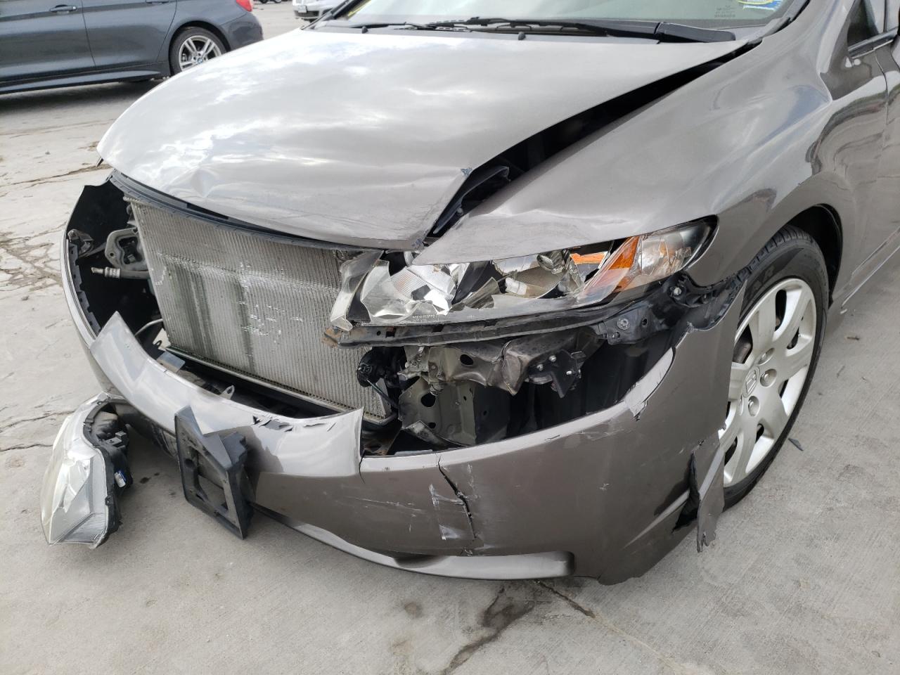 Photo 9 from auction – 2009 HONDA CIVIC LX with VIN 19XFA16589E003216