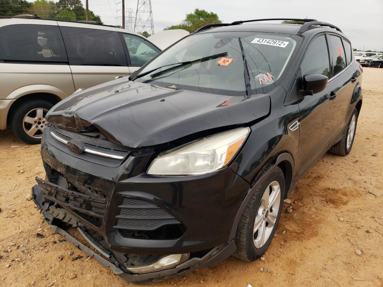 Photo 2 from auction – 2014 FORD ESCAPE SE with VIN 1FMCU9GX5EUA26811