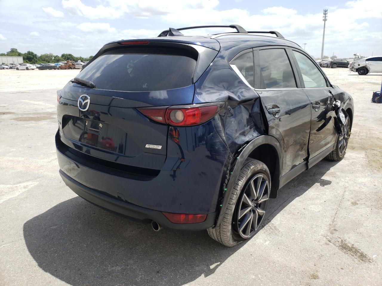 Photo 4 from auction – 2018 MAZDA CX-5 TOURI with VIN JM3KFACM6J0415876