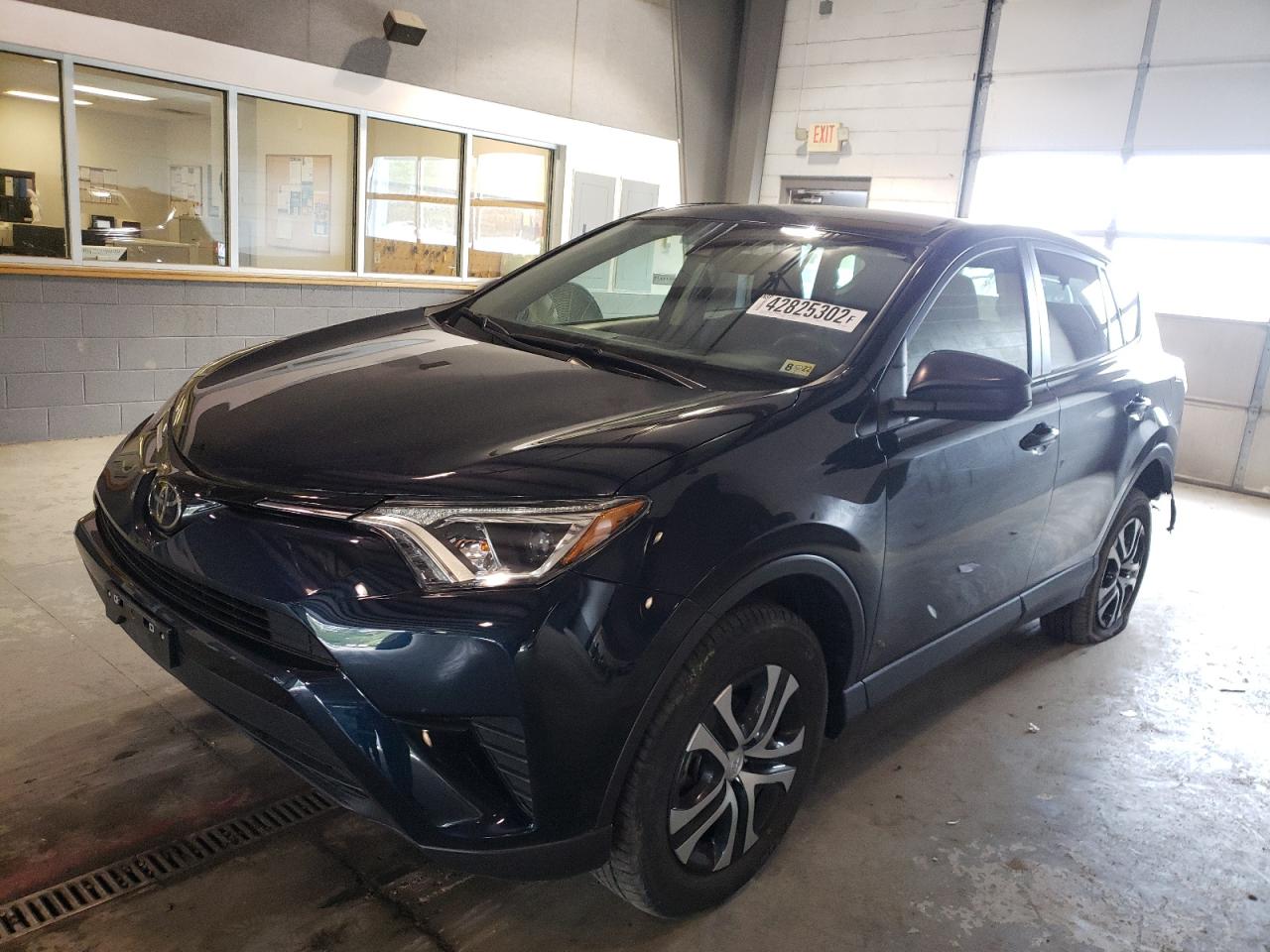 Photo 2 from auction – 2018 TOYOTA RAV4 LE with VIN JTMBFREV2JJ241053