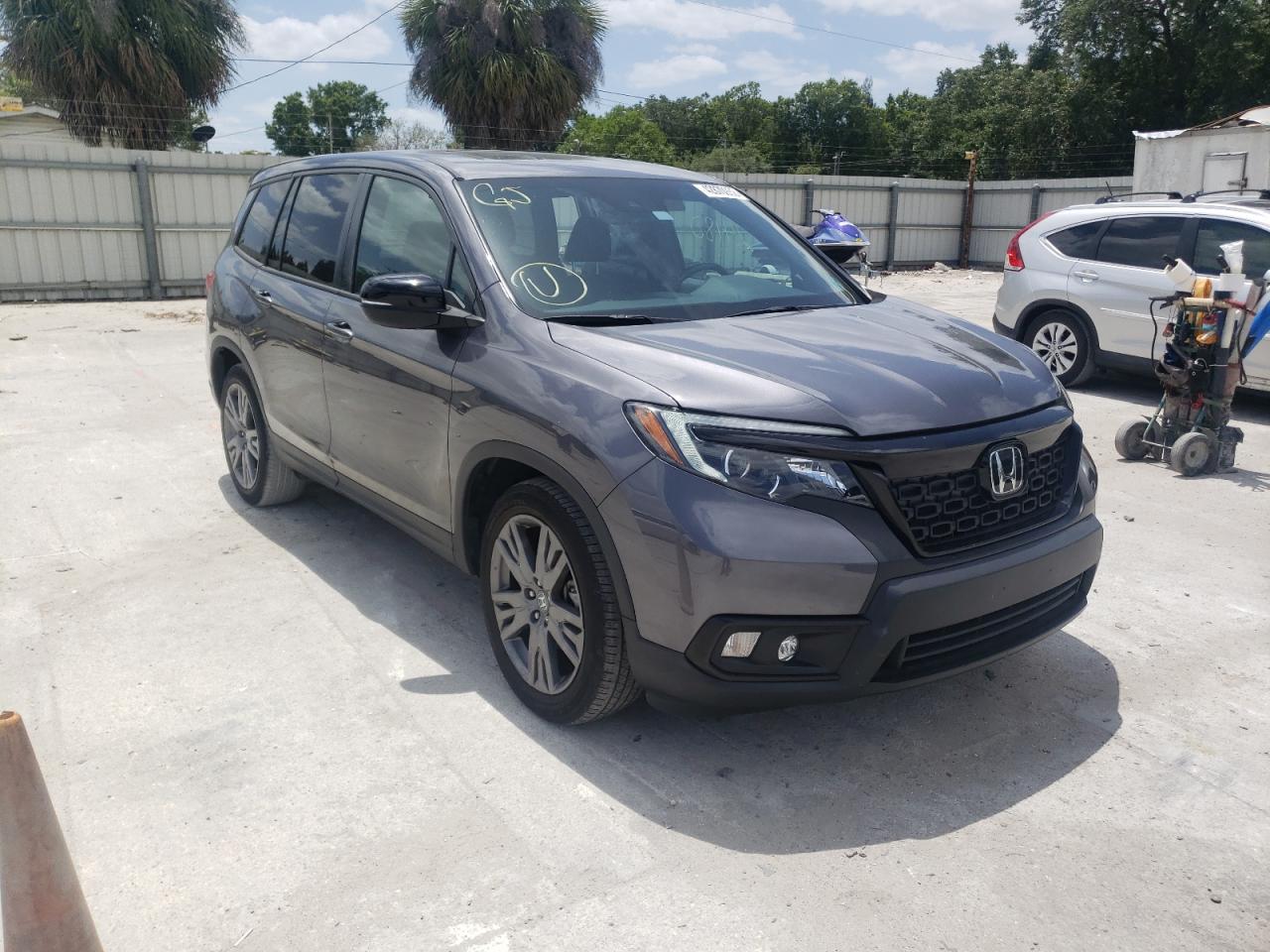HONDA PASSPORT E 2020 with VIN 5FNYF7H50LB001987 - Photo from auction