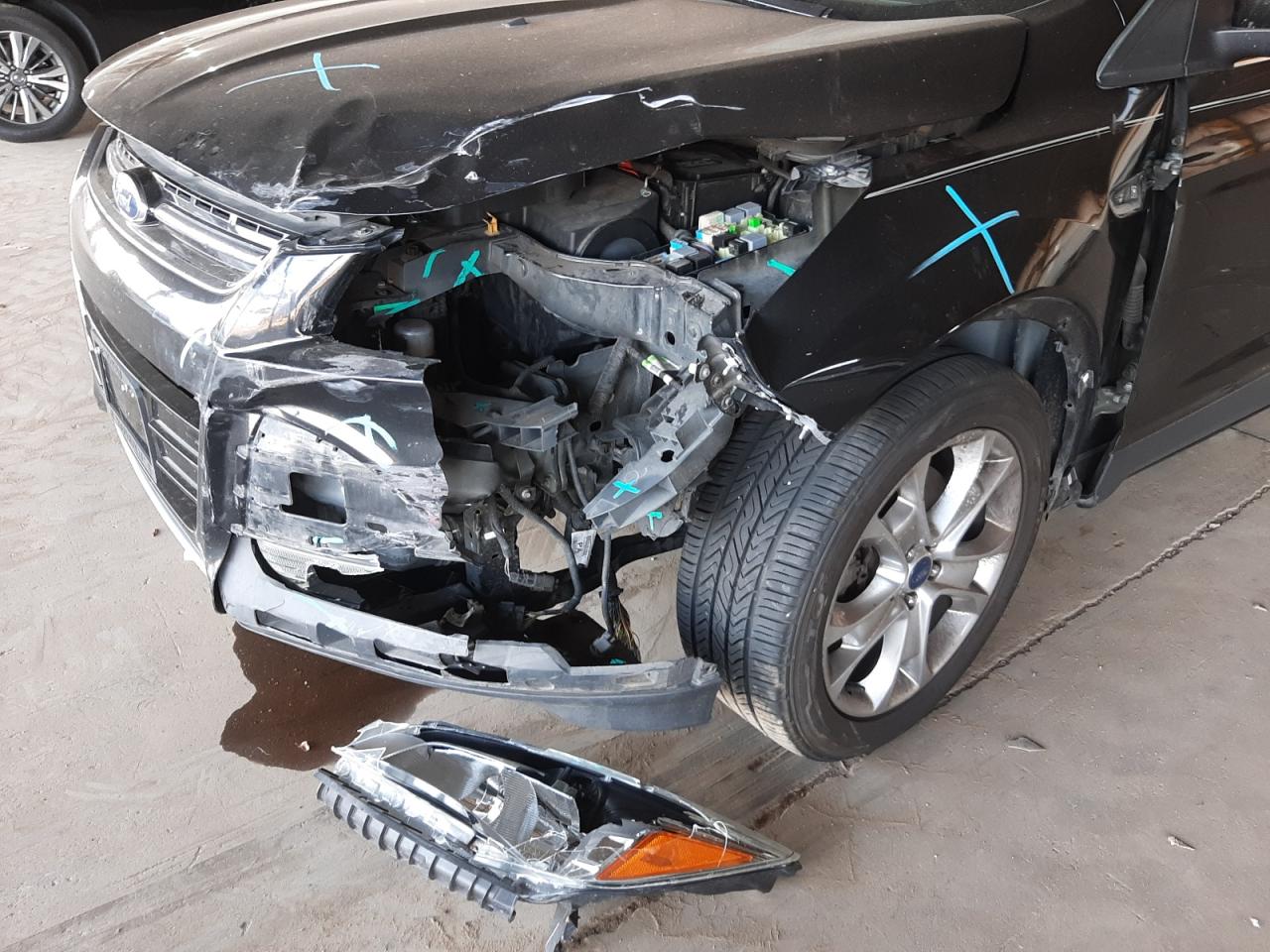 Photo 9 from auction – 2014 FORD ESCAPE TIT with VIN 1FMCU0J97EUA11636